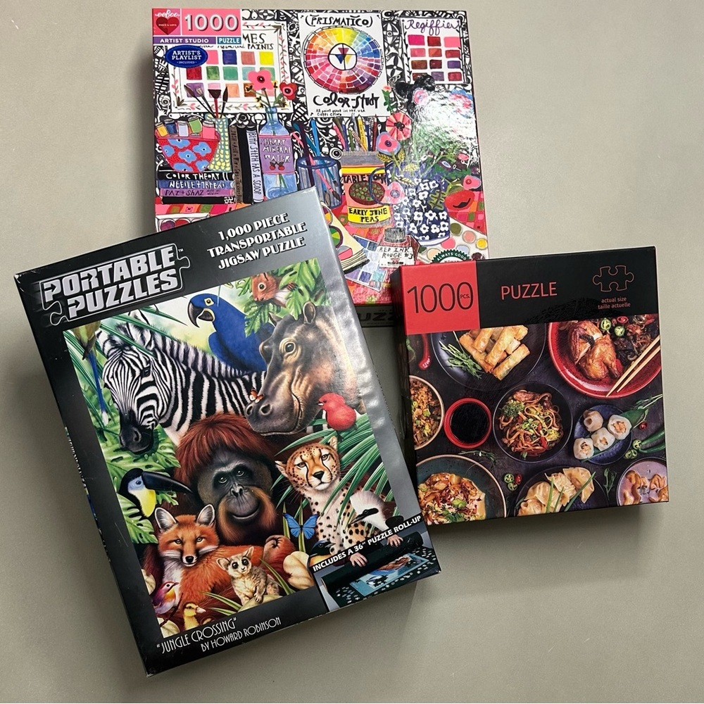 Three Colorful 1000 Piece Assorted Jigsaw Puzzles